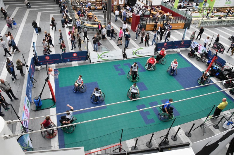 a wheelchair basketball team is playing 